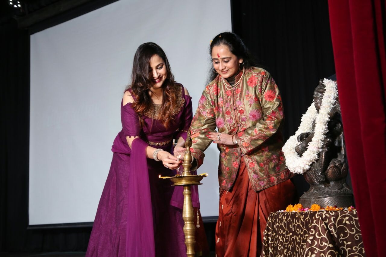 Lamp lighting ceremony at dance academy event