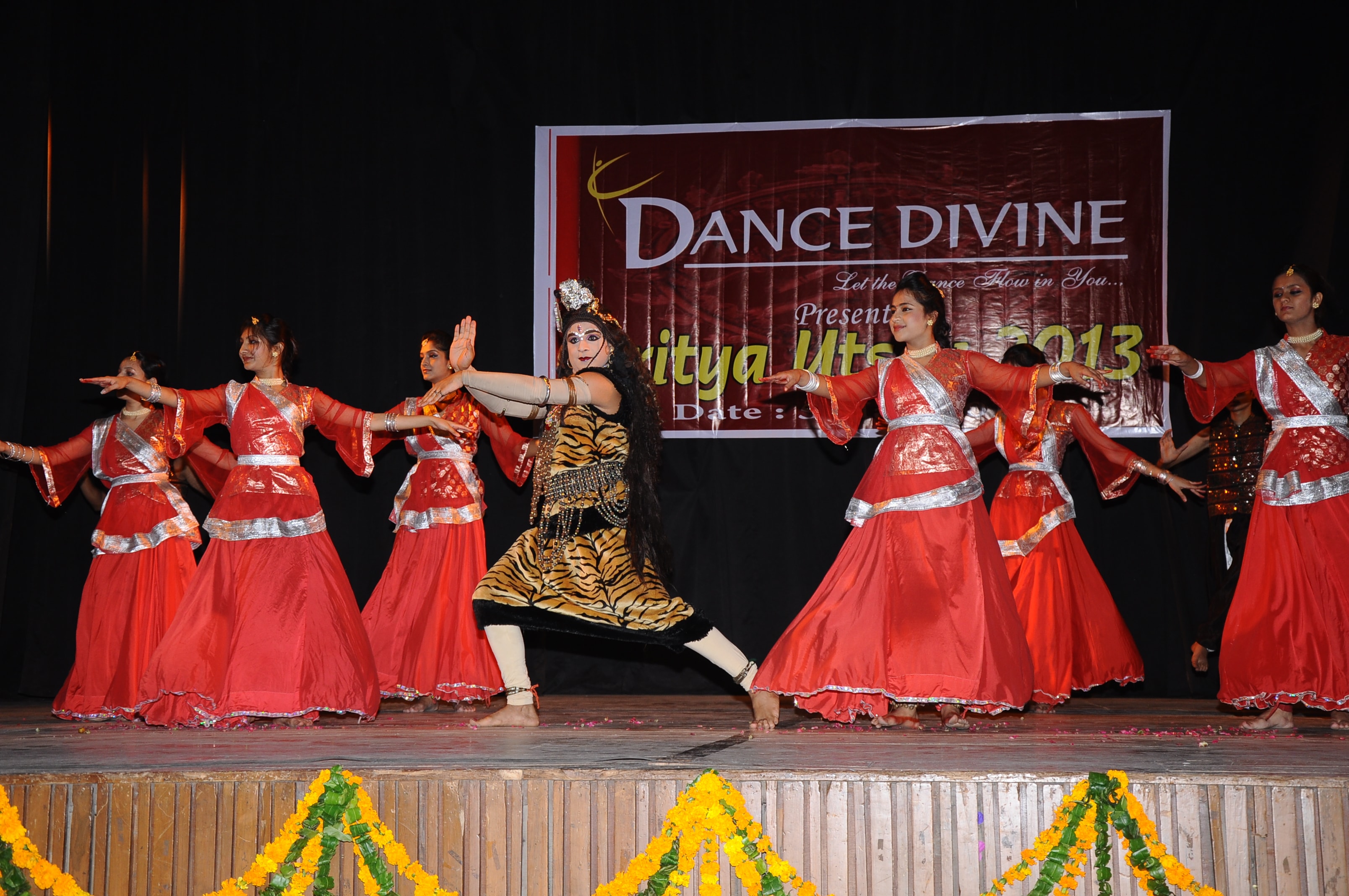 Group performance at Nritya Utsav 2013 in red costumes