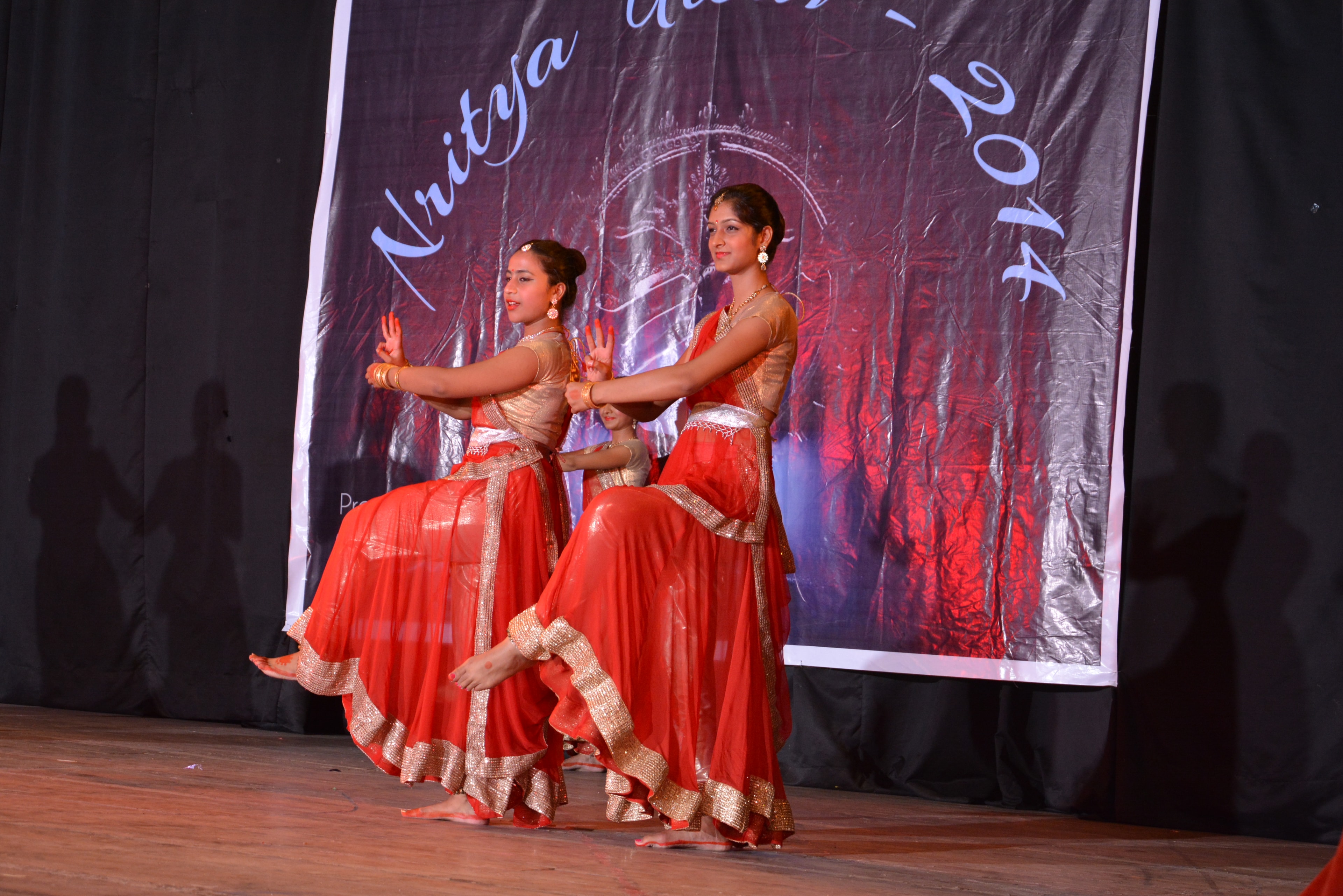 Two dancers in red and gold at Nritya Utsav 2014